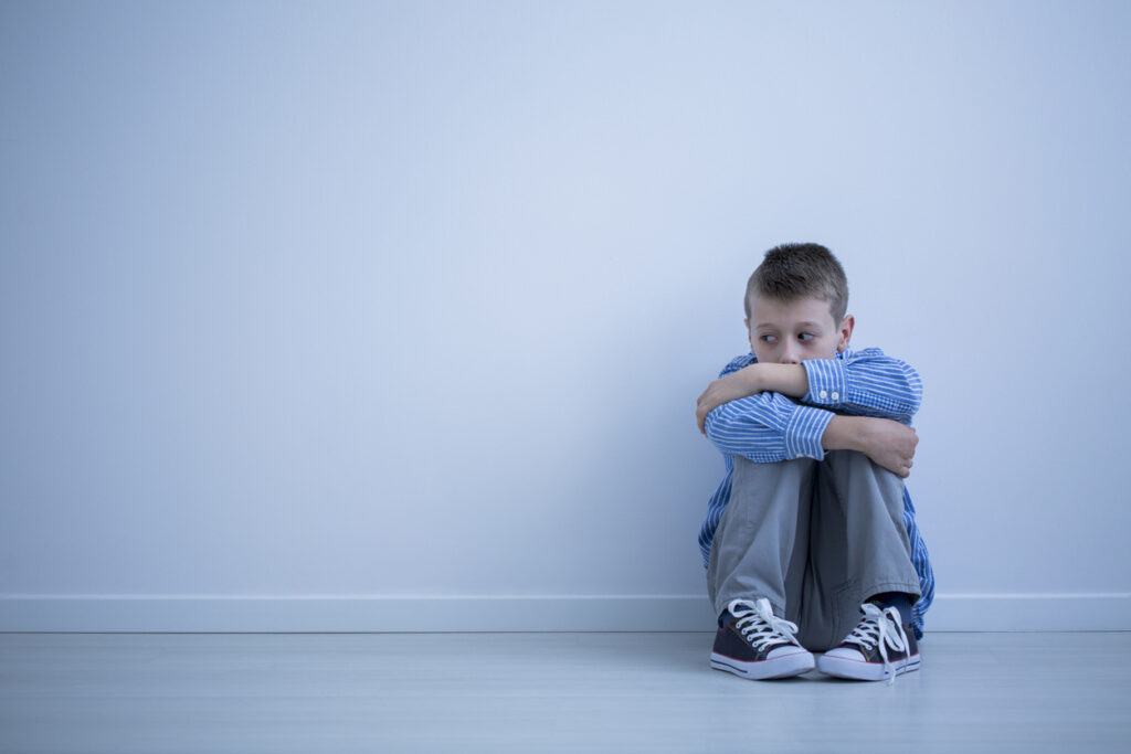 Sad alienated child with autism