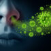 Influenza concept and seasonal flu virus spread caused by infectious microbes with human symptoms of fever infecting the nose and throat as deadly microscopic cells with 3d illustration elements.