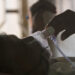 FILE - In this March 24, 2018 file photo, a relative adjusts the oxygen mask of a tuberculosis patient at a TB hospital on World Tuberculosis Day in Hyderabad, India. The number of people killed by tuberculosis has risen for the first time in more than a decade, largely because fewer people got tested and treated as resources were diverted to fight the coronavirus pandemic, the World Health Organization said in a report released Thursday, Oct. 14, 2021. (AP Photo/Mahesh Kumar A., file)